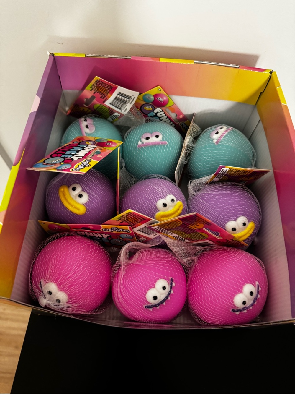 Set of 9 Funny Face Squishy Balls
